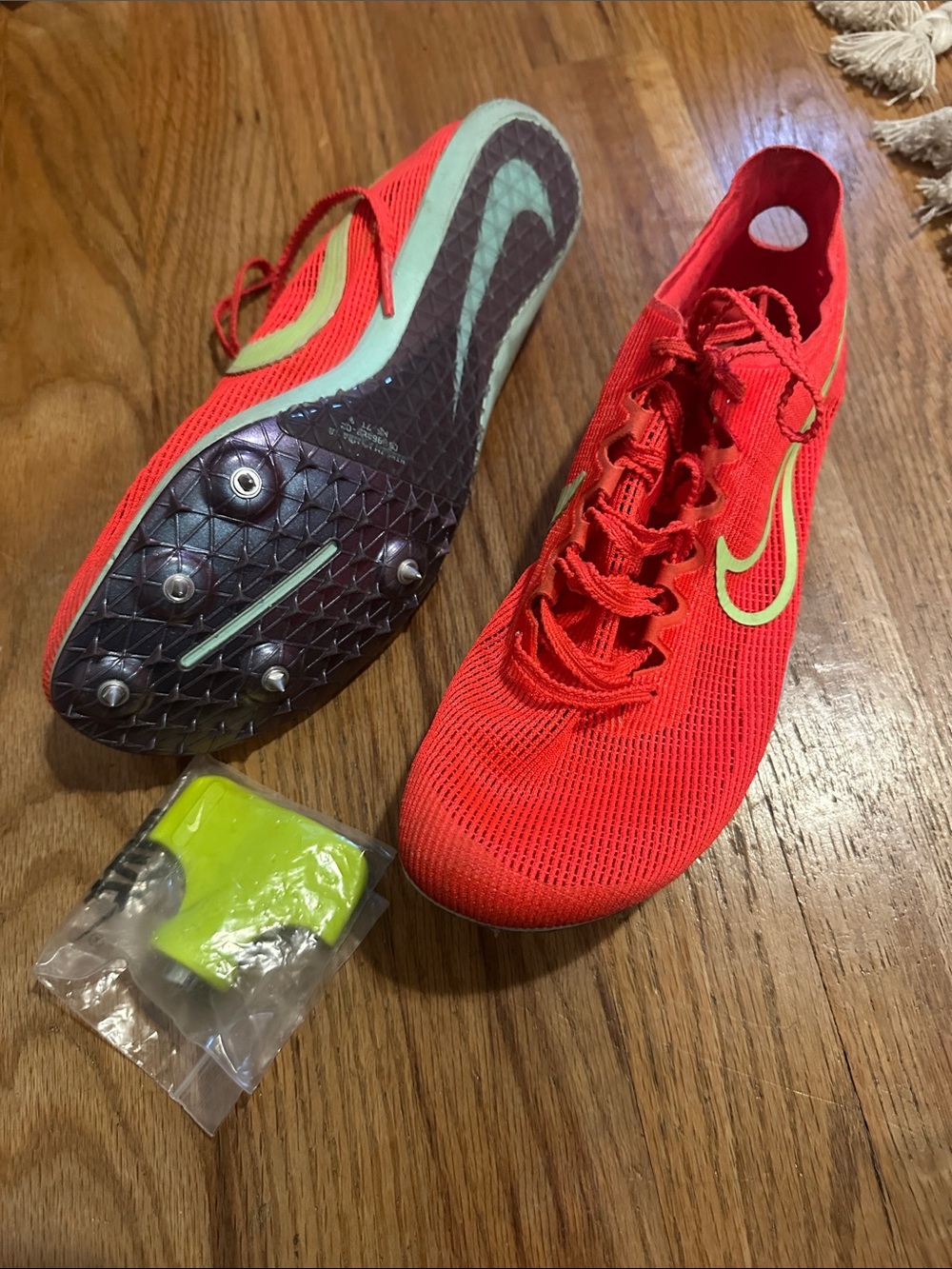 Nike track spikes.  Size 6 Knit with Yellow Swoosh